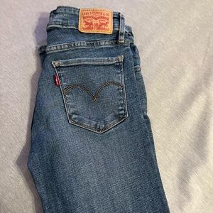 Medium wash womens skinny jeans